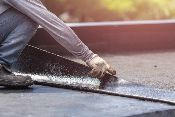 Professional Waterproofing technician working in Oliver Springs, TN
